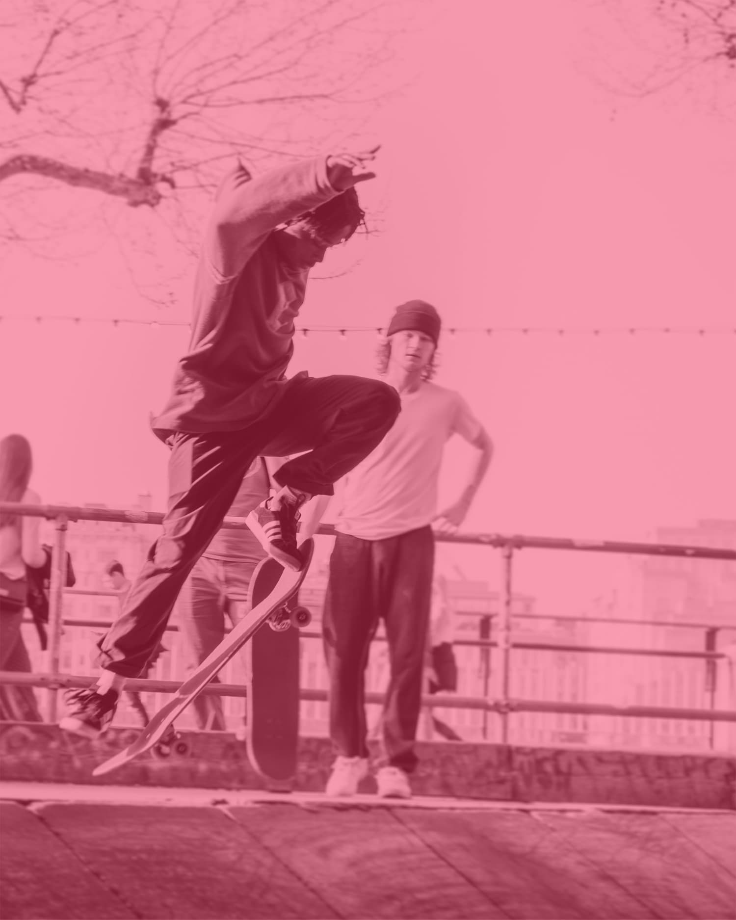 young man performing a skateboard trick